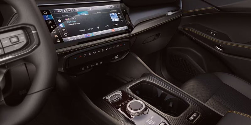 2026 Jeep Cherokee interior showing the touchscreen display, climate controls, and center console.