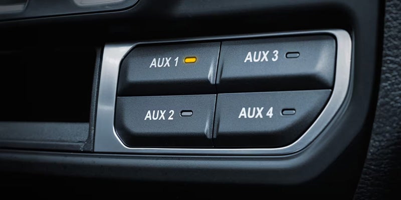 2026 Jeep Wrangler auxiliary switch controls.